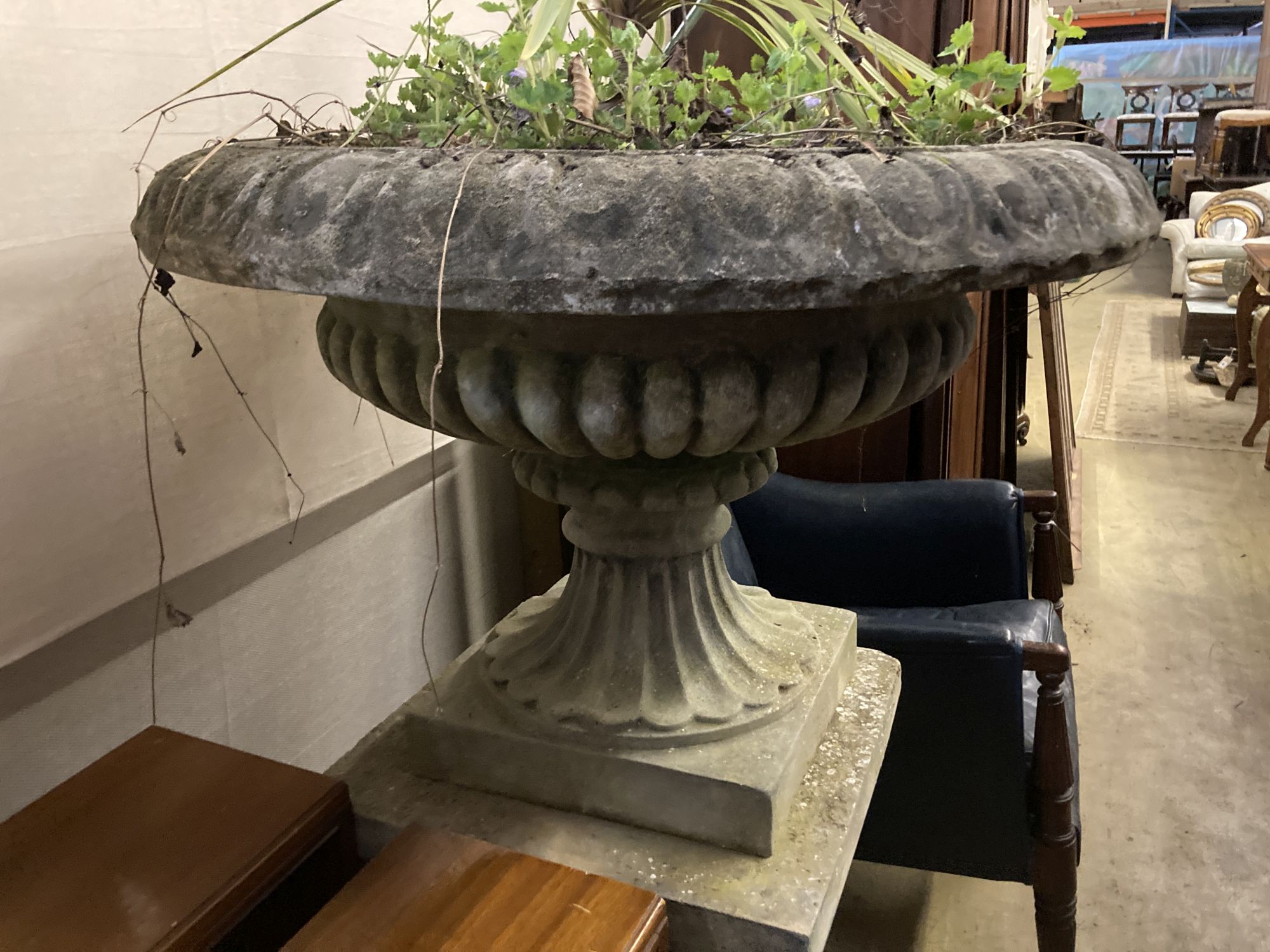 A reconstituted stone Campana garden urn and pedestal, diameter 80cm height 128cm